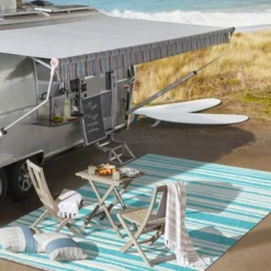 Castara Wavy Stripe Modern Indoor/Outdoor Area Rug - JONATHAN Y -Furniture store GUEST 1c630a7e a73c 4a91 9176 66c029969683