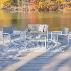 Elina 4-Piece Modern Coastal Faux Wicker Conversation Outdoor Patio Set - JONATHAN Y -Furniture store GUEST 9d6947c3 6eda 4835 9110 dfe9b2743f6e