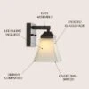 JONATHAN Y Staunton 1-Light Iron/Glass Modern Cottage LED Vanity Light